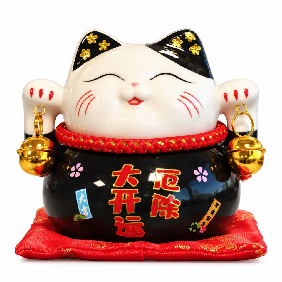 Tirelire chat en céramique sur coussin : noir sur coussin
