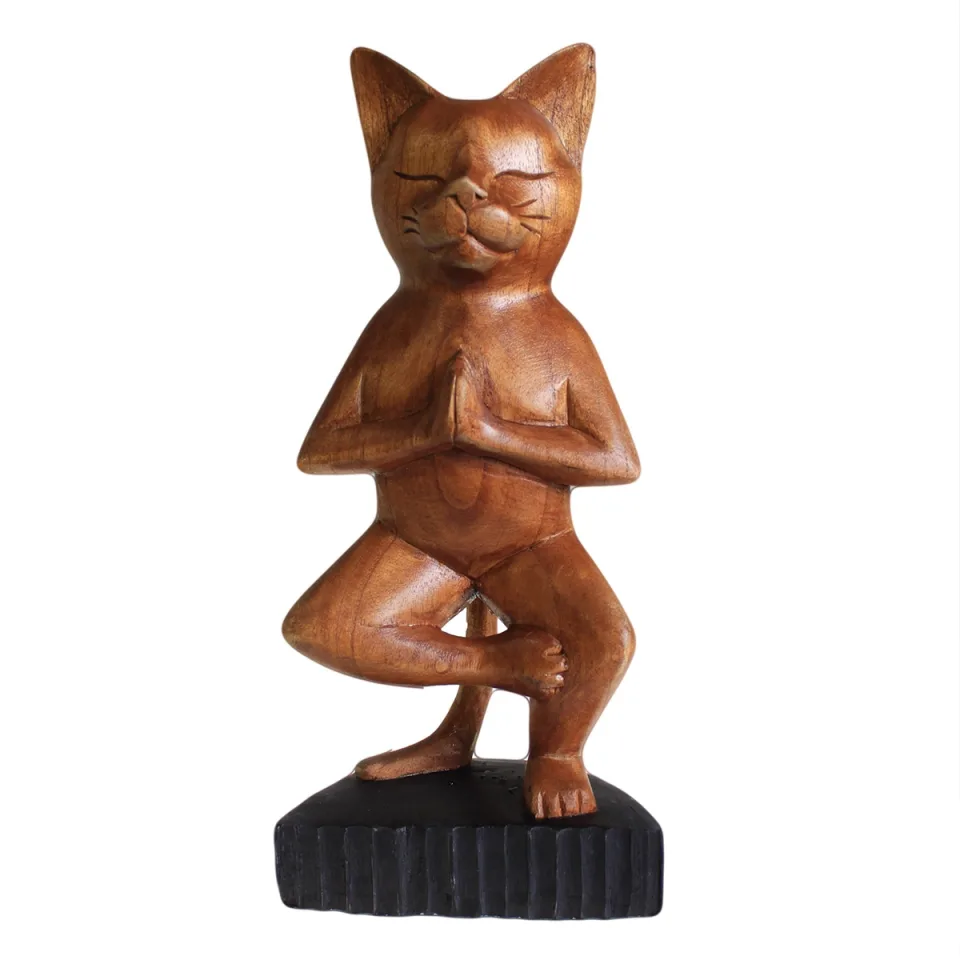Chats de yoga sculptés : Sur une jambe