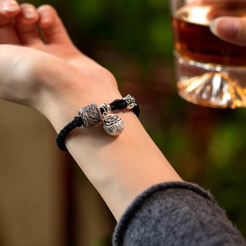 Bracelet Tibétain Noir à Breloques en Cuivre